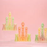 Two large castle shaped wax bottle candies by Oodles filled with fruit juice