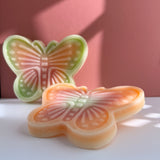 Two large butterfly shaped wax candies by Oodles with colorful fruit juice filling
