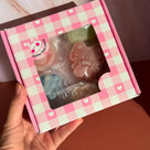 Close up of handmade cat shaped wax candy showing cute kitty face details